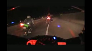 Bikes Racing Down Highway