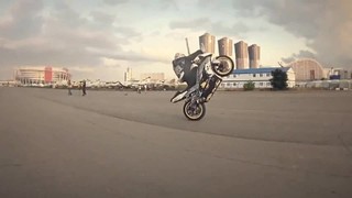 Motorcycle stunt for a girl